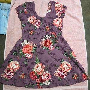 A purple/ pink flower dress